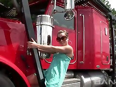 Seductive shapely ladies flash their butts and tits next to big trucks