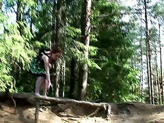 Amateur leggy and skinny bitch pulls her skirt to piss in the woods