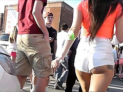 Lots of awesome bubble butts in shorts are taped on cam outdoors