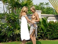 Teen blondes fingering each other by the poolside