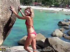 Hot and naked blonde girl gives blowjob after sunbathing on the rock