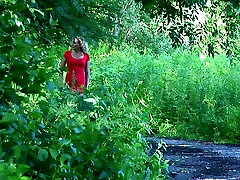Blonde back hole glasses white chick in red dress pisses on the road in the forest