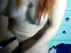 Busty white redhead babe on webcam naked masturbating