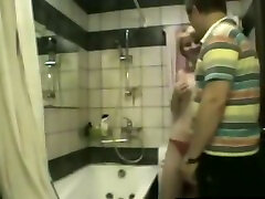 Blonde sporty teen in the bathroom with her man having fun