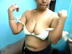 Lovely chubby aunty shows off her naked pussy and titties