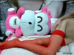 Korean geek babe loves her large plastic sex toys