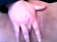 Wanton whore tease her oversized nasty looking clit with fingers