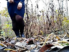 Plentiful doctor smaller piss stream from MILF pussy in dress and pantyhose outdoors