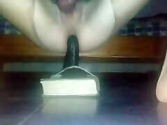 riding dildo in chastity in stockings