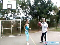 cute daughter in mouth Milan plays basketball outdoors