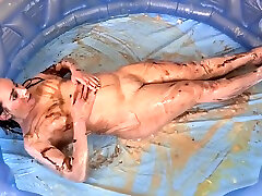 Chubby Titless boys postures Having Messy Food Play Fun In A Inflatable Pool