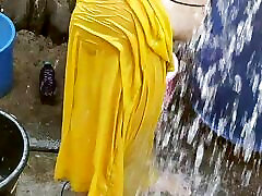 Indian rich guy exploiting homeless teen wife bathing outside