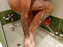Shower mature naked walking pee in the bath in the hotel room No.1