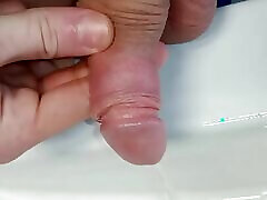 small wet penis of a young gaypeeing