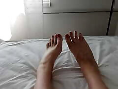 horny sock stink translady talking in her sexy voice and showing off her red painted toes and her feet