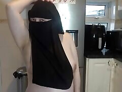 Dancing fully nude in Niqab