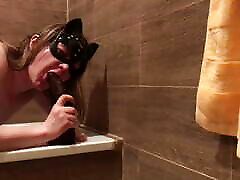 Masked sissy worships BBC in a bathroom