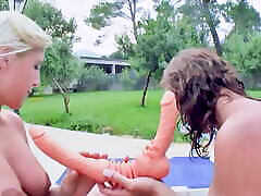 Two naughty German babes having some fun in the backyard