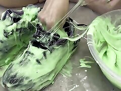 Trashing sneakers trainers with super sticky slime