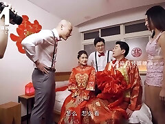 Sweet asian teen gets shared by two lustful guys in sofa after the wedding