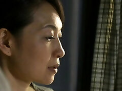 Uber-sexy older japanese nurse gets her large titties felt up