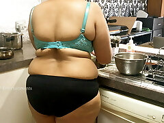 Big orbs Bhabhi in the Kitchen wearing panties and bra