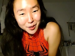 Hairless Asian milf squirting while masturbate on webcam