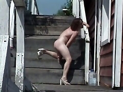 Really super-naughty nympho uses a faux-cock to pet her wet pussy right outdoors