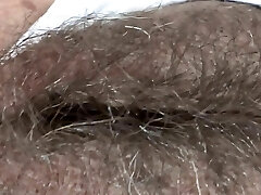 While I rest at the motel on the beach, my boss films my ample hairy pussy