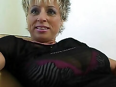 Older German chick with enormous natural tits playing with her sex toy