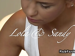 Blonde massages sexy brown-haired with hot stones