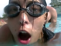 Lecherous stunner Candy gives a blowjob underwater and gets ravaged in the pool