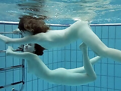 Cute teen chick Anna Netrebko swims naked with her Girlfriend