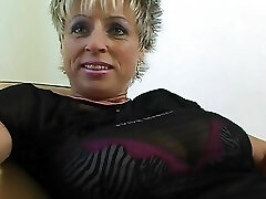 Old German chick with huge natural tits toying with her sex toy