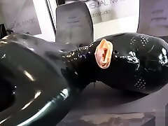 Doll in full Latex condom catsuit