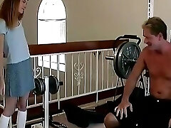 Skinny Barely Legal Slut Gargles a Rock Hard Cock on a Weight Bench Then Gets Drilled