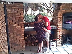 Spycam: CC TV self catering accomodation couple plumbing on front porch of nature reserve
