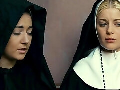 Charlotte Stokely is a horny nun who wants to be enticed by a gal