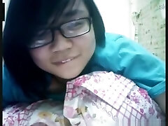 Nerdy asian lady has cybersex with her bf on skype