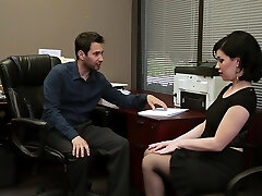 Belle Noire dressed in nylon stockings gets fucked in the office