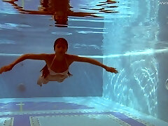 Splendid all alone svelte mermaid Irina Russaka flashes her small globes underwater