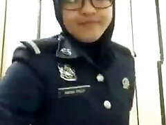 arab police woman taking her hijab out and flash her ass
