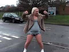 Chubby blondie pissing outdoors