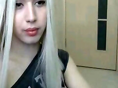 Ultra-cute Russian Shemale Sucks Dildo so Beautifully