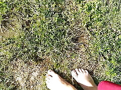 Nikita Walks Around In The Park And Plays With A Tree - Foot Fetish