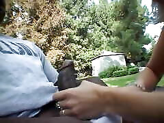 Mature blonde bitch sucks black dick in garden