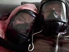 Gasmask breathing in plastic suits