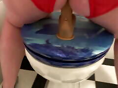 Slave Rides Dildo in the Toilet