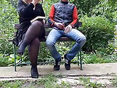 Curvy mother-in-law jerks johniy since her son-in-law in the park while reading a book