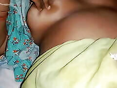 Tamil Chitra went to the bed room and sat down and stroked her gently and then quickly lowered her down and looked away